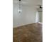 Spacious living room with tile floors, overhead lighting, and neutral wall color at 6011 Skydale Way # 101, Riverview, FL 33578