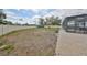Expansive backyard featuring a vinyl fence, a shed, and ample space for outdoor activities at 6333 Spanish Main Dr, Apollo Beach, FL 33572