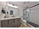 Modern bathroom featuring sleek vanity, updated fixtures, glass shower, and neutral finishes at 6333 Spanish Main Dr, Apollo Beach, FL 33572