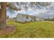 Charming single-story home featuring a well-manicured lawn and an attached garage with driveway at 6333 Spanish Main Dr, Apollo Beach, FL 33572