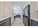 Bright kitchen featuring a stainless-steel refrigerator and lots of counter and cabinet space for cooking and storage at 6333 Spanish Main Dr, Apollo Beach, FL 33572