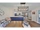Open concept kitchen featuring a large island, a dining area, and sightlines to living space at 6333 Spanish Main Dr, Apollo Beach, FL 33572