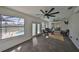 Inviting sunroom with tile floor, offering relaxing poolside views through large screened windows at 6333 Spanish Main Dr, Apollo Beach, FL 33572