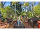 Inviting back porch featuring a seating area and decorated with greenery at 912 E 23Rd Ave, Tampa, FL 33605
