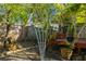 Scenic back yard featuring lush greenery, a garden, and mature trees at 912 E 23Rd Ave, Tampa, FL 33605