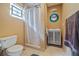 Bathroom featuring a walk-in shower and sleek vanity at 912 E 23Rd Ave, Tampa, FL 33605