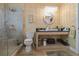 Modern bathroom with a glass-enclosed shower, updated fixtures, and a stylish vanity at 912 E 23Rd Ave, Tampa, FL 33605