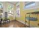 Bedroom with lots of natural light and interesting furniture and lamps at 912 E 23Rd Ave, Tampa, FL 33605