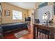 Cozy bedroom with wood floors, closet, and comfortable furniture at 912 E 23Rd Ave, Tampa, FL 33605