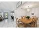 Charming dining room featuring a wooden table set and elegant chandelier at 200 W Louisiana Ave, Tampa, FL 33603