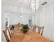 Spacious dining area with stylish light fixture and wood table at 200 W Louisiana Ave, Tampa, FL 33603