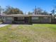 Single-story home with a well-maintained front yard at 200 W Louisiana Ave, Tampa, FL 33603