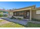 Charming front porch with seating and wrought iron details at 200 W Louisiana Ave, Tampa, FL 33603