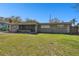 Charming single-story home with a well-maintained lawn and mature trees at 200 W Louisiana Ave, Tampa, FL 33603