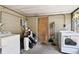 Laundry machines sit on the ground floor at 200 W Louisiana Ave, Tampa, FL 33603