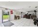 Living room with sliding glass doors and tile flooring at 200 W Louisiana Ave, Tampa, FL 33603