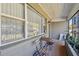 Cozy porch area with seating, plants, and natural light at 200 W Louisiana Ave, Tampa, FL 33603