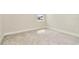 This bedroom features a window allowing for lots of natural light and plush carpeting at 10714 Torchwood Sea Way, San Antonio, FL 33576