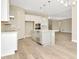 Spacious kitchen opens up to the living space, and features stainless appliances and a center island at 10714 Torchwood Sea Way, San Antonio, FL 33576