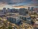 Stunning aerial view of a modern apartment complex nestled in a vibrant cityscape under a beautiful sky at 111 N 12Th St # 1314, Tampa, FL 33602