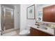 Modern bathroom features a glass-enclosed shower, stylish vanity, and contemporary fixtures at 111 N 12Th St # 1314, Tampa, FL 33602