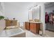 Well-lit bathroom with a soaking tub, double vanity, and tile accents at 111 N 12Th St # 1314, Tampa, FL 33602