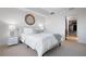 Bright bedroom features a bed, decor, and a doorway to an organized walk-in closet at 111 N 12Th St # 1314, Tampa, FL 33602
