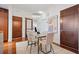 This dining area has a view of the home office and hardwood floors at 111 N 12Th St # 1314, Tampa, FL 33602