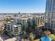 A modern apartment building with multiple balconies, city views, and lush landscaping at 111 N 12Th St # 1314, Tampa, FL 33602