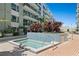 Relaxing hot tub area with lush tropical plants, lounge seating, and a peaceful ambiance at 111 N 12Th St # 1314, Tampa, FL 33602