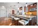 Open kitchen design with a large center island, modern stools, and stainless steel appliances at 111 N 12Th St # 1314, Tampa, FL 33602
