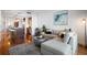 Modern living room with stylish furniture, hardwood floors, and an open floor plan at 111 N 12Th St # 1314, Tampa, FL 33602