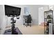 Functional office space with desk, chair, computer, and exercise bike in a well-lit environment at 111 N 12Th St # 1314, Tampa, FL 33602