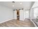 Basement featuring a laundry area concealed by sliding barn doors, and a charming window seat at 112 Rose St, Venice, FL 34293