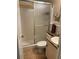 Bathroom featuring a walk-in shower and updated vanity at 11251 80Th Ave # 210, Seminole, FL 33772