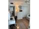 Bedroom with a modern desk, closet, and a comfortable sofa, perfect for a home office at 11251 80Th Ave # 210, Seminole, FL 33772