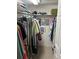 Walk-in closet with organized clothing and shelves at 11251 80Th Ave # 210, Seminole, FL 33772