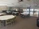 Spacious clubhouse featuring tables, chairs, and ample room for gatherings and events at 11251 80Th Ave # 210, Seminole, FL 33772