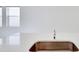 Close-up of a sink and countertop in the kitchen at 129 Whiteland Bnd, Nokomis, FL 34275