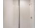 Modern shower with glass doors and white tile creating a clean and bright space at 129 Whiteland Bnd, Nokomis, FL 34275
