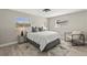 Bedroom with neutral tones, plenty of light, and featuring a geometric patterned rug at 1464 S Evergreen Ave, Clearwater, FL 33756
