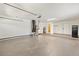 This is a two car garage with an entryway door to the house, and a water heater and hvac unit at 1464 S Evergreen Ave, Clearwater, FL 33756