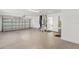 This is a spacious two car garage with an entryway door to the house at 1464 S Evergreen Ave, Clearwater, FL 33756