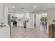 Modern kitchen with stainless steel appliances and sleek white cabinetry at 1464 S Evergreen Ave, Clearwater, FL 33756