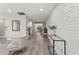 Spacious living room with natural light and a view into the kitchen and dining area at 1464 S Evergreen Ave, Clearwater, FL 33756