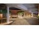 Grand hotel lobby featuring a fountain, lush plants, and elegant entryway at 15000 Madeira Way # 518, Madeira Beach, FL 33708