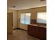 Functional kitchen featuring classic cabinetry, tiled floor, and ample natural light at 1835 15Th S Ave, St Petersburg, FL 33712