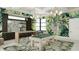 Game room featuring a pool table, bar, and stylish decor at 18585 Watercolor Ave, Venice, FL 34293