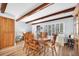 Bright dining room with wood floors and ample seating, creating an inviting space for meals at 2170 Americus S Blvd # 6, Clearwater, FL 33763