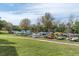 Outdoor kayak storage with a variety of colorful kayaks on racks at 2170 Americus S Blvd # 6, Clearwater, FL 33763